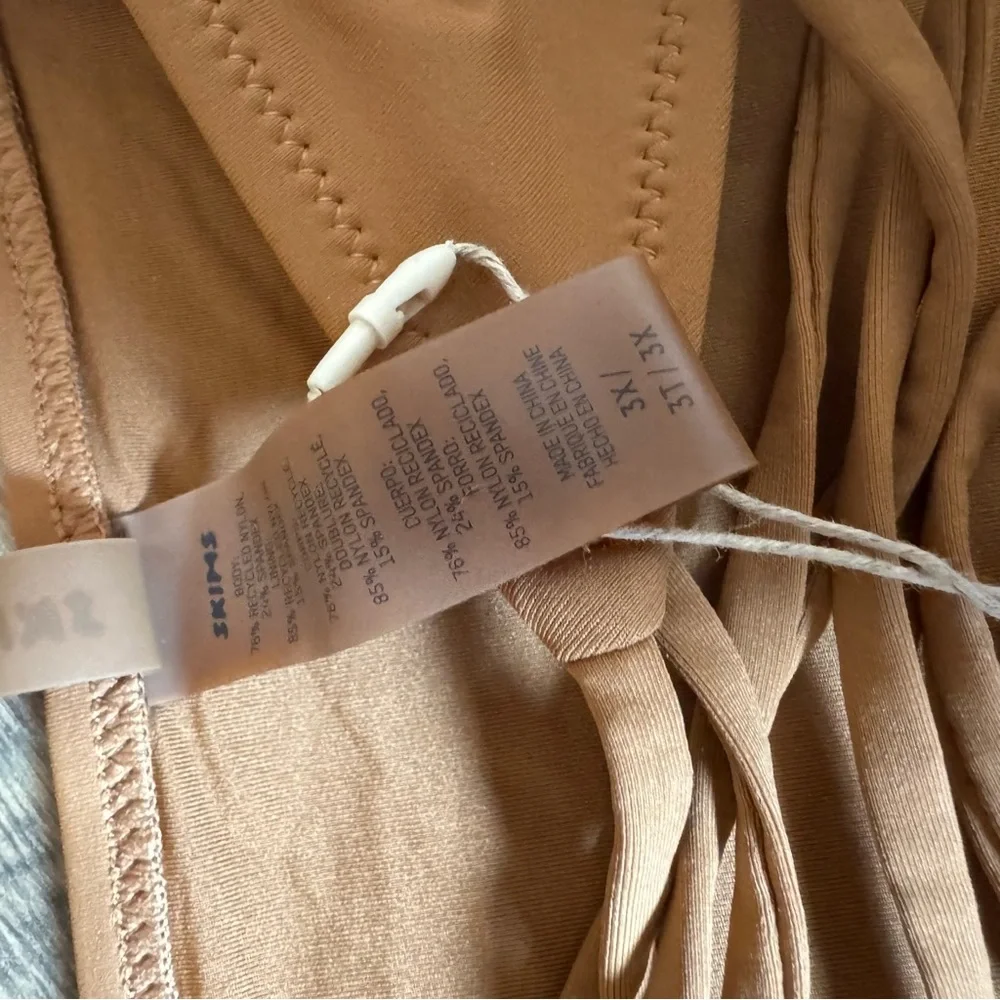 SKIMS chic tan
